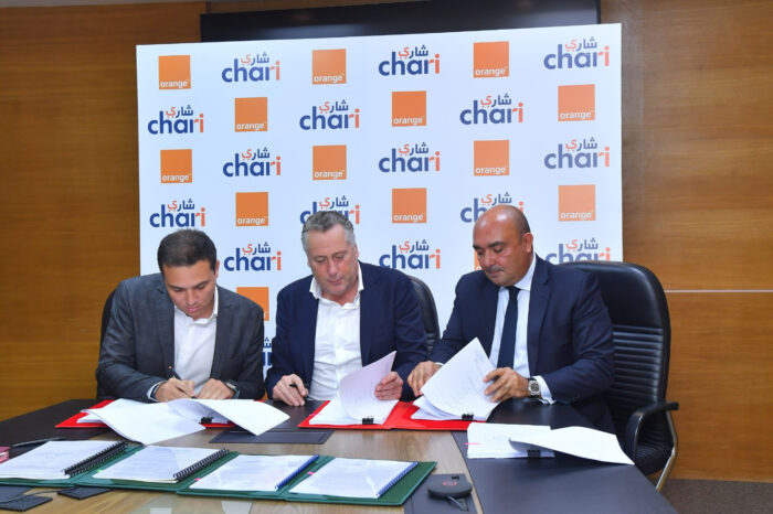 Orange Maroc et Chari.ma  scaled - Orange Maroc et Chari.ma : un partenariat stratégique pour la transformation digitale et l’inclusion financière des épiciers marocains